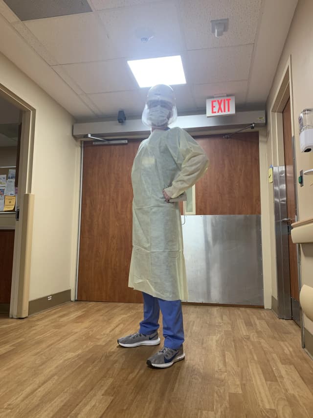 Myself posing while working in the ICU during the height of the covid pandemic