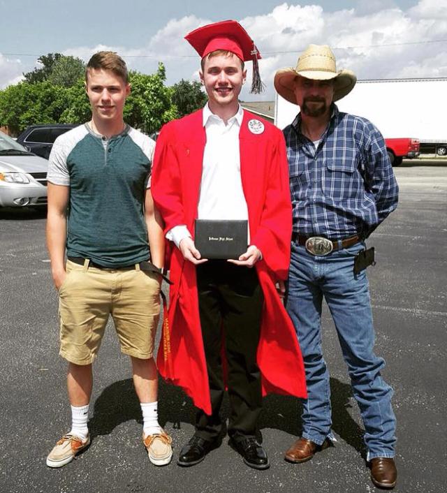 Highschool graduation photo 2016 with brother and father